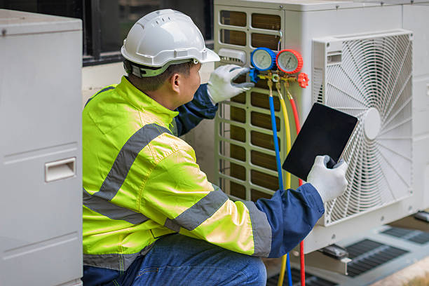 Professional Heat Pump Repair technician working in Fredericksburg, VA